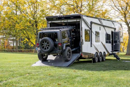 with-a-name-like-game-changer-what-do-you-expect-home-on-wheels-with-garage-166256_1